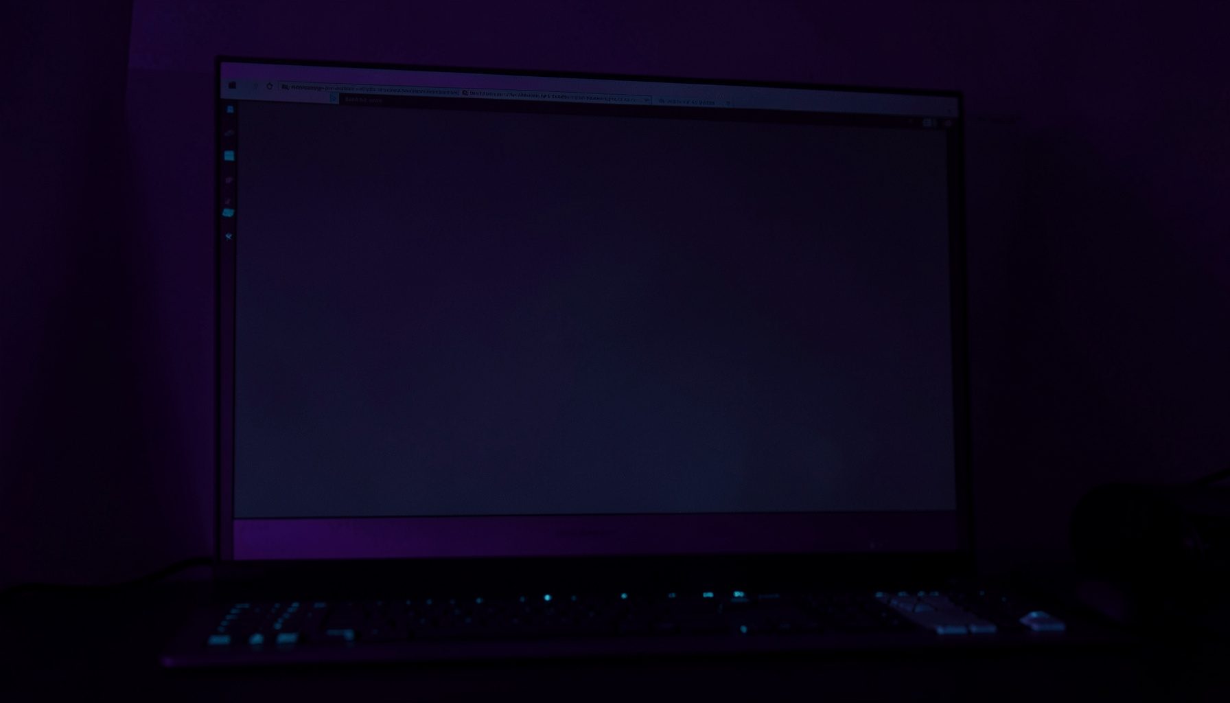 A moody duotone image in deep violet and cyan showing a Windows desktop setup with a minimalist dark workspace and soft ambient glow.